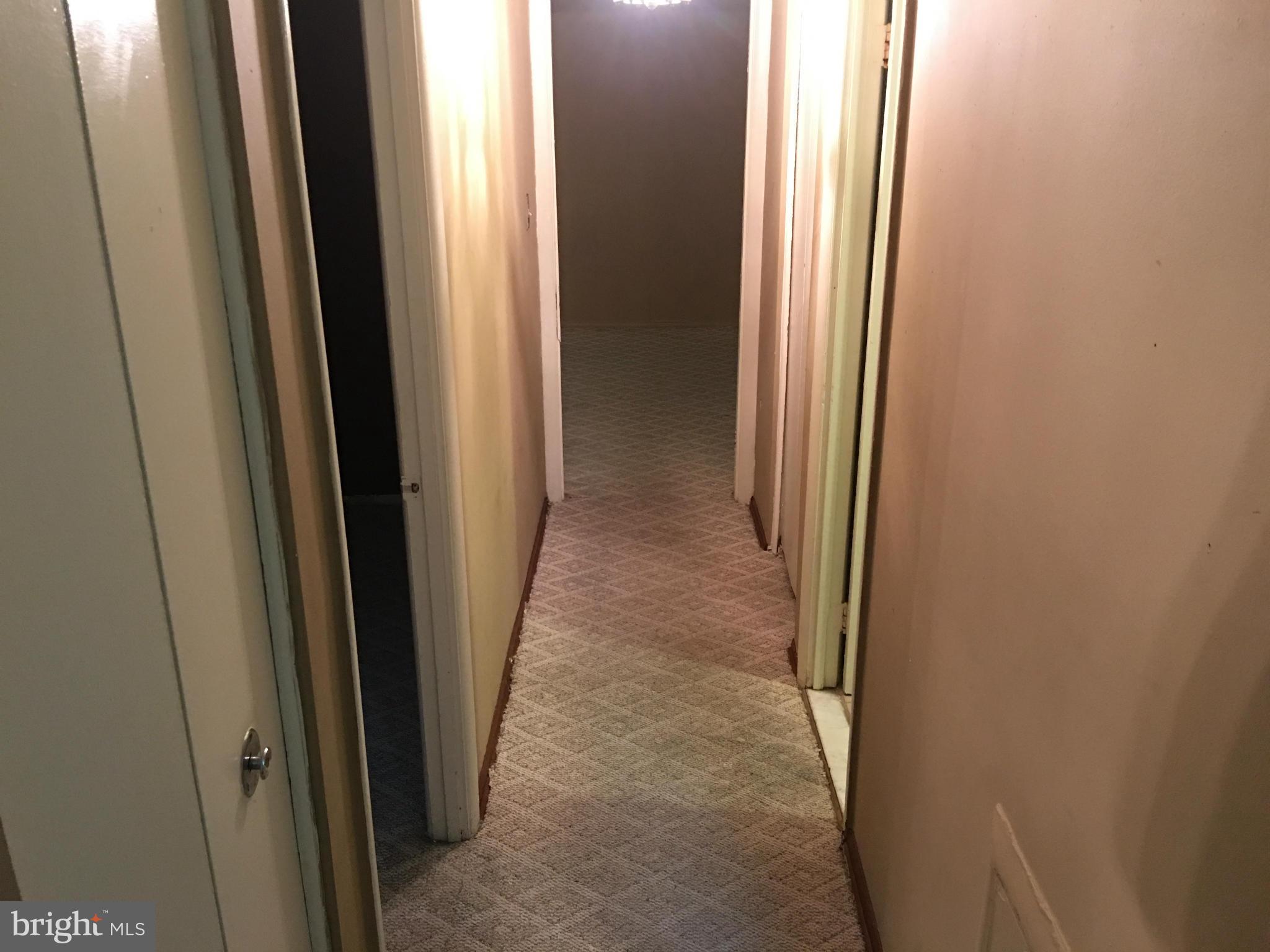 9270 Adelphi Road, Unit 103 Hyattsville, MD 20783 - Photo 10 of 14 a view of a hallway