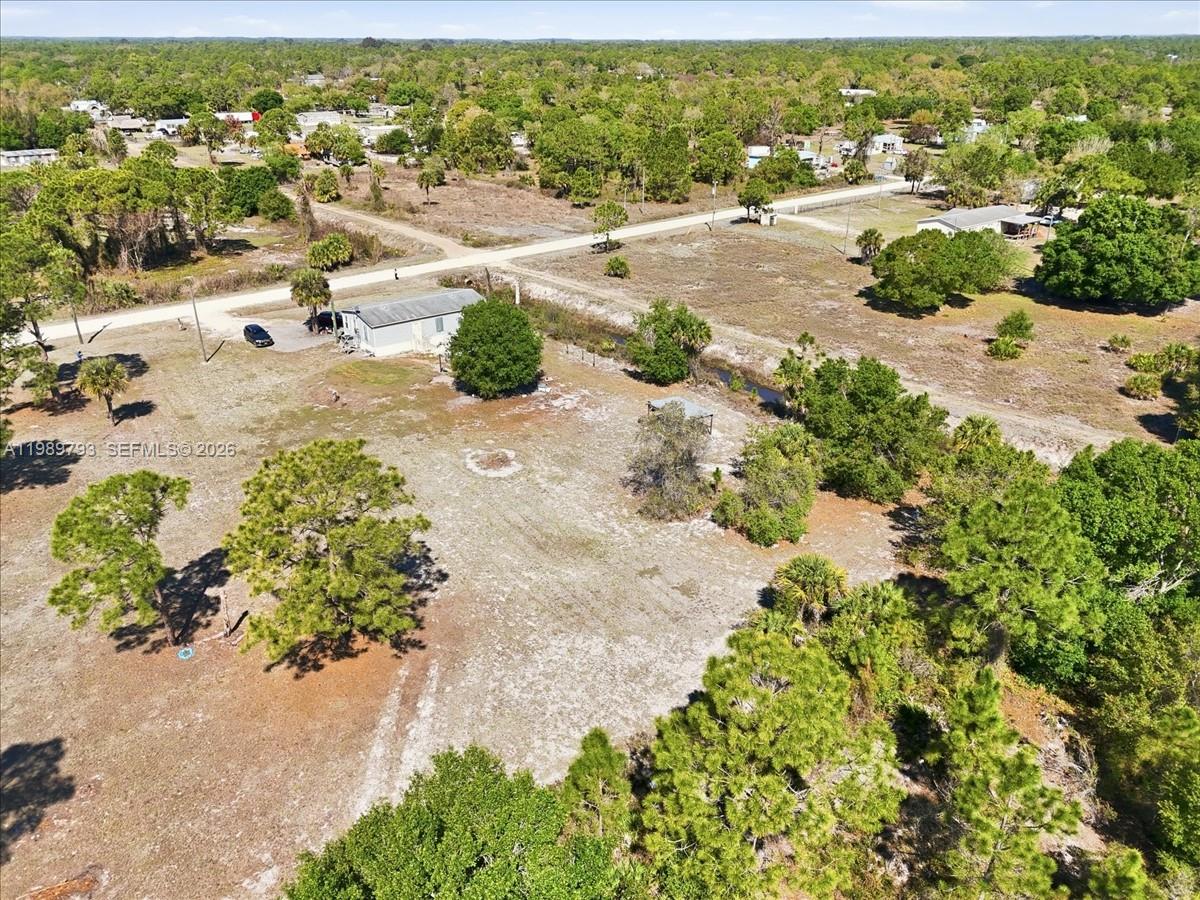 415 South Kennel Street Clewiston, FL 33440 - Photo 23 of 34 an aerial view of residential houses with outdoor space
