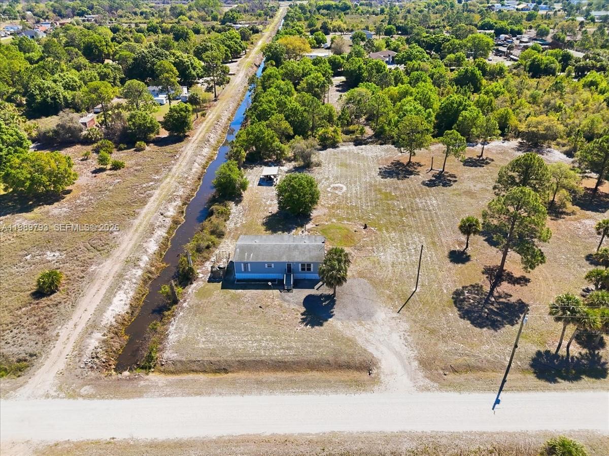 415 South Kennel Street Clewiston, FL 33440 - Photo 26 of 34 an aerial view of residential houses with outdoor space