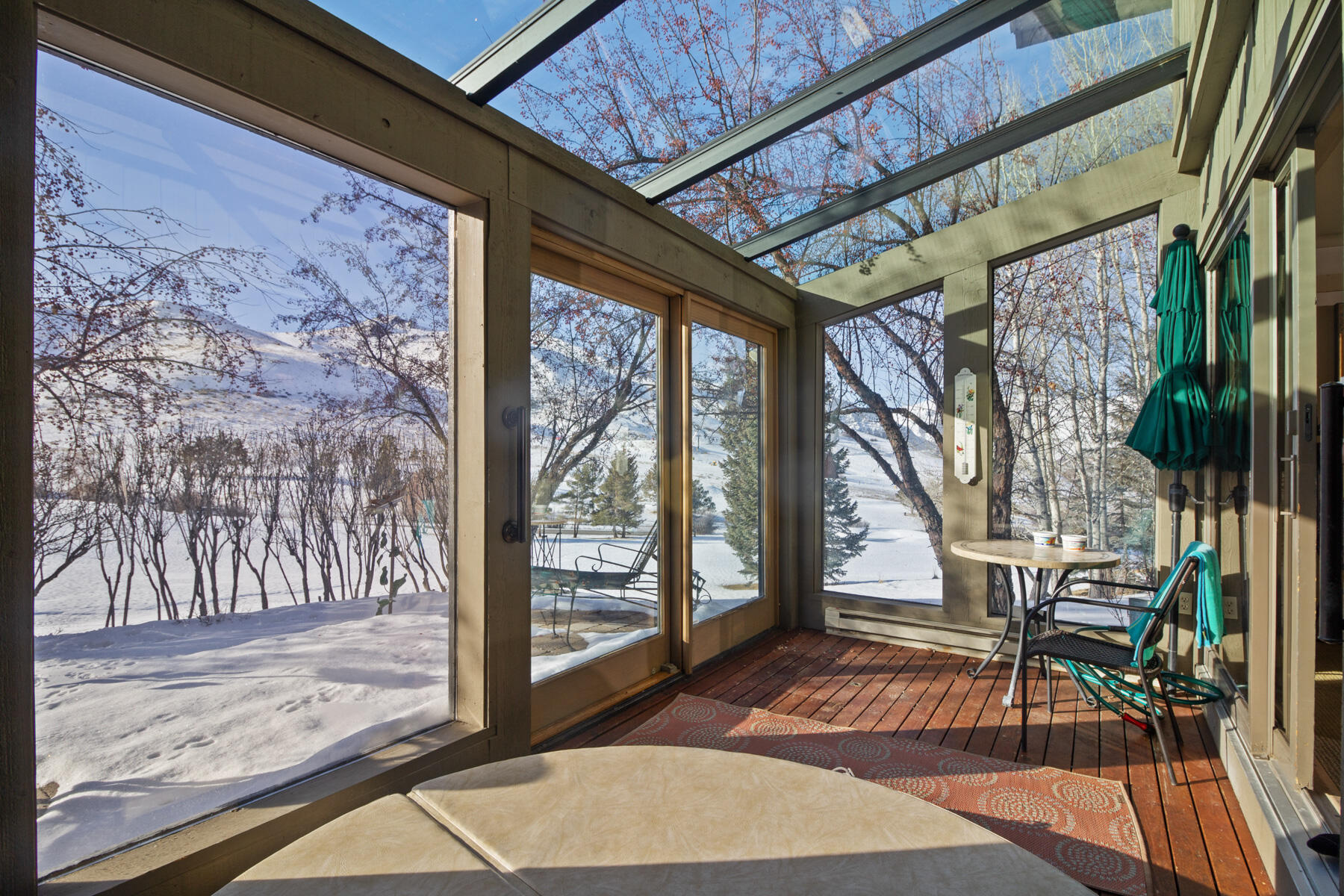 117 Skyline Drive Sun Valley, ID 83353 - Photo 22 of 27 Sunroom with Hot Tub