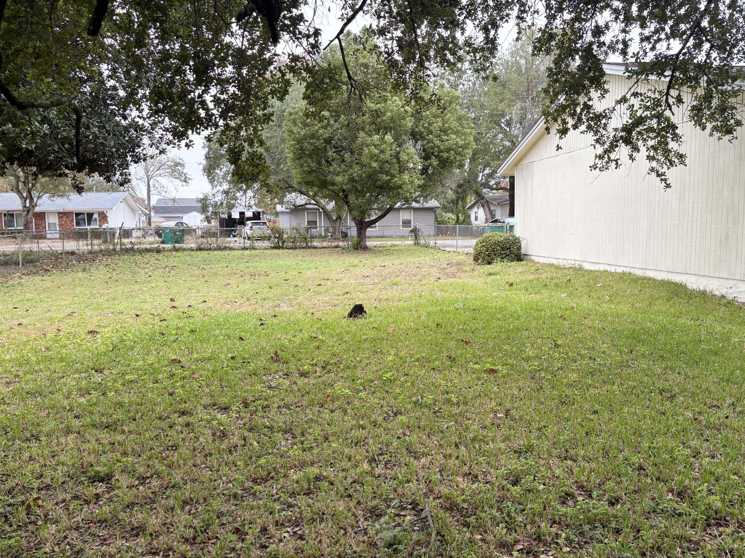 208 Squirrel Haven Road, Unit A Mary Esther, FL 32569 - Photo 12 of 13 a view of outdoor space yard and lake