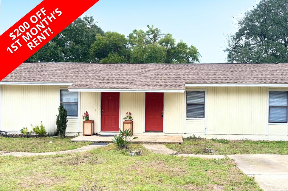 208 Squirrel Haven Road, Unit A Mary Esther, FL 32569 - Photo 13 of 13 a view of outdoor space yard and front view of a house