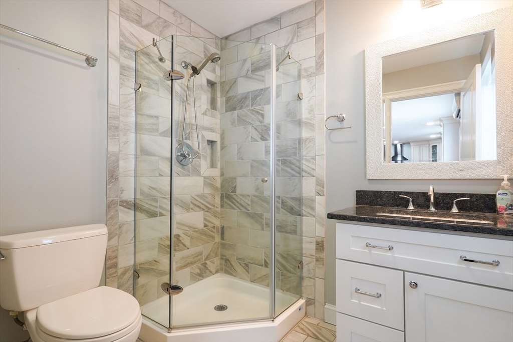 162 Fiskdale Road Brookfield, MA 01506 - Photo 13 of 42 a bathroom with a sink a toilet and shower