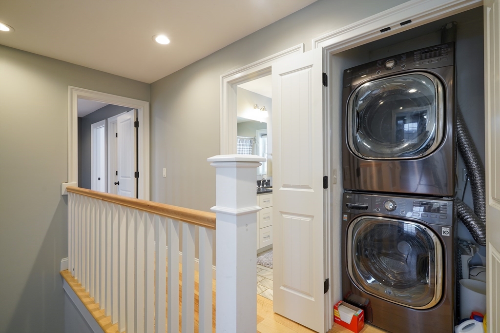 162 Fiskdale Road Brookfield, MA 01506 - Photo 22 of 42 a view of a hallway with washer and dryer