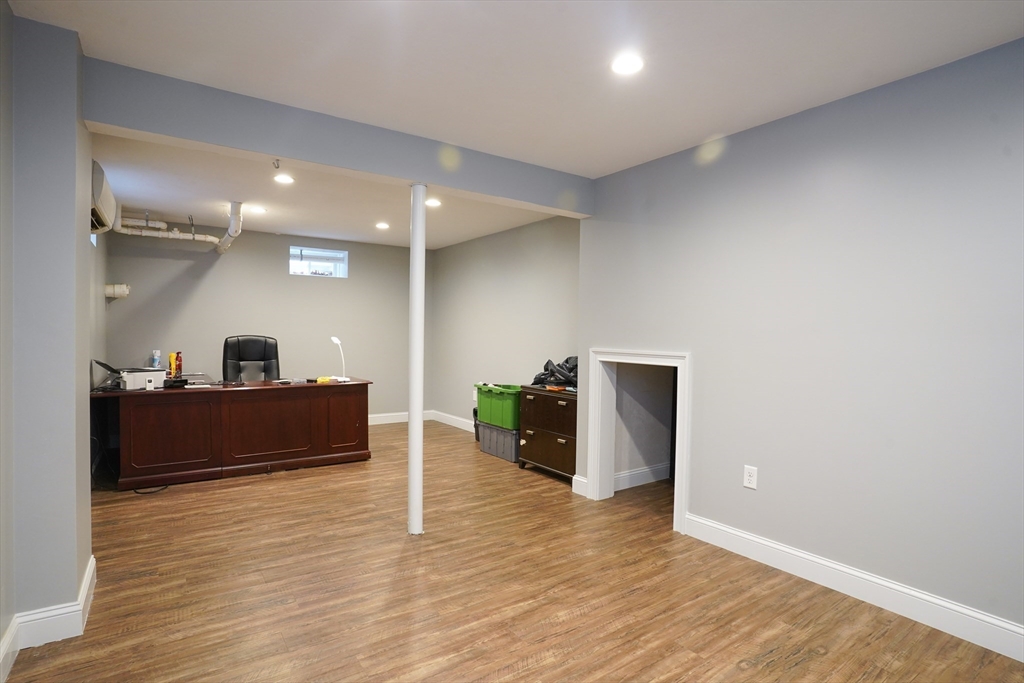 162 Fiskdale Road Brookfield, MA 01506 - Photo 34 of 42 a living room with furniture and a wooden floor
