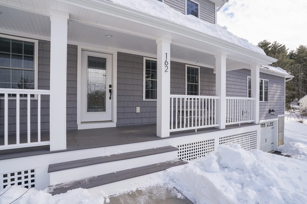162 Fiskdale Road Brookfield, MA 01506 - Photo 37 of 42 front view of a house with a porch