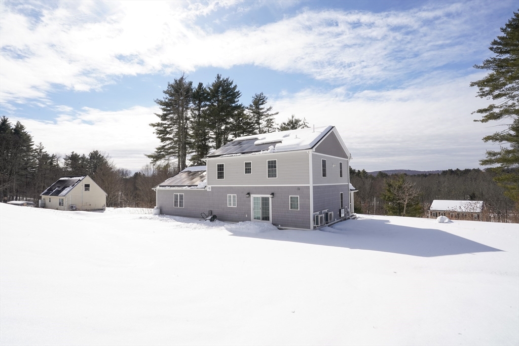 162 Fiskdale Road Brookfield, MA 01506 - Photo 41 of 42 a street view with residential house