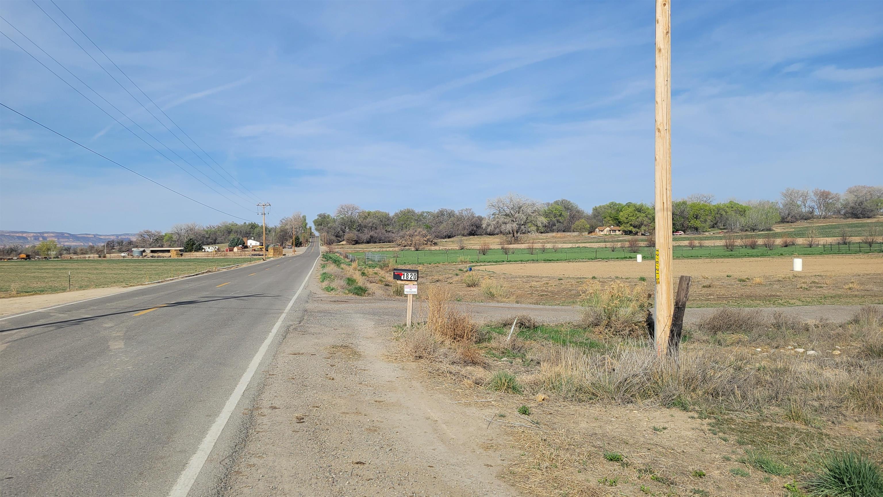 1844 M Road Fruita, CO 81521 - Photo 9 of 32 a view of a road with an ocean view