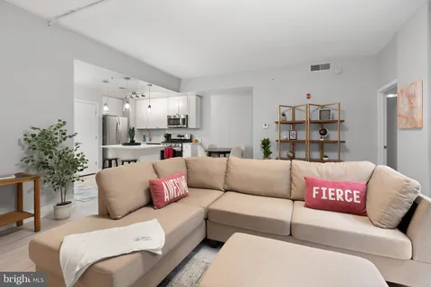 a living room with furniture and a couch