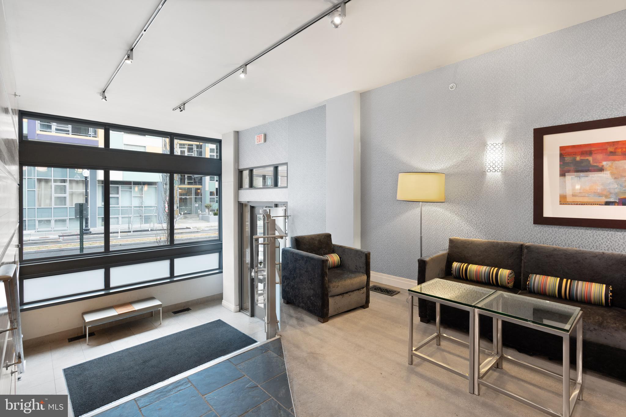 2120 Vermont Avenue Northwest, Unit 17 Washington, DC 20001 - Photo 26 of 35 a living room with furniture