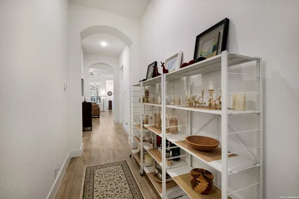 a kitchen with a stove and a refrigerator