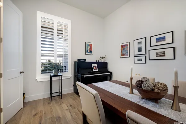 a kitchen with a table and chairs