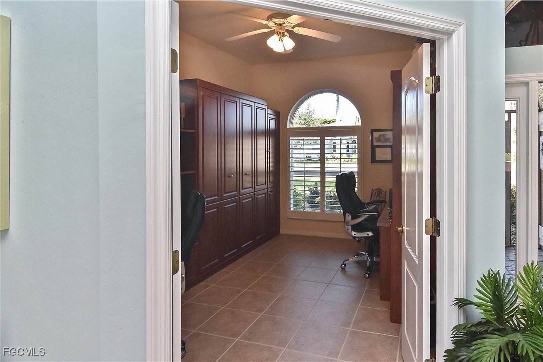 11131 Wine Palm Road Fort Myers, FL 33966 - Photo 21 of 48 a view of entryway with a grandfather clock and a large window