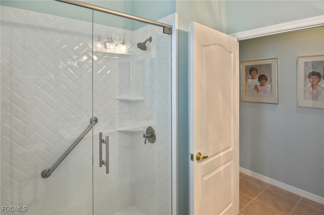 11131 Wine Palm Road Fort Myers, FL 33966 - Photo 35 of 48 a bathroom with a shower