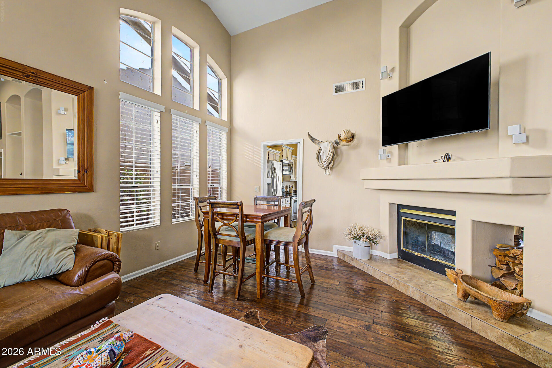 4309 East Rancho Caliente Drive Cave Creek, AZ 85331 - Photo 7 of 37 a view of a livingroom with furniture and a flat screen tv