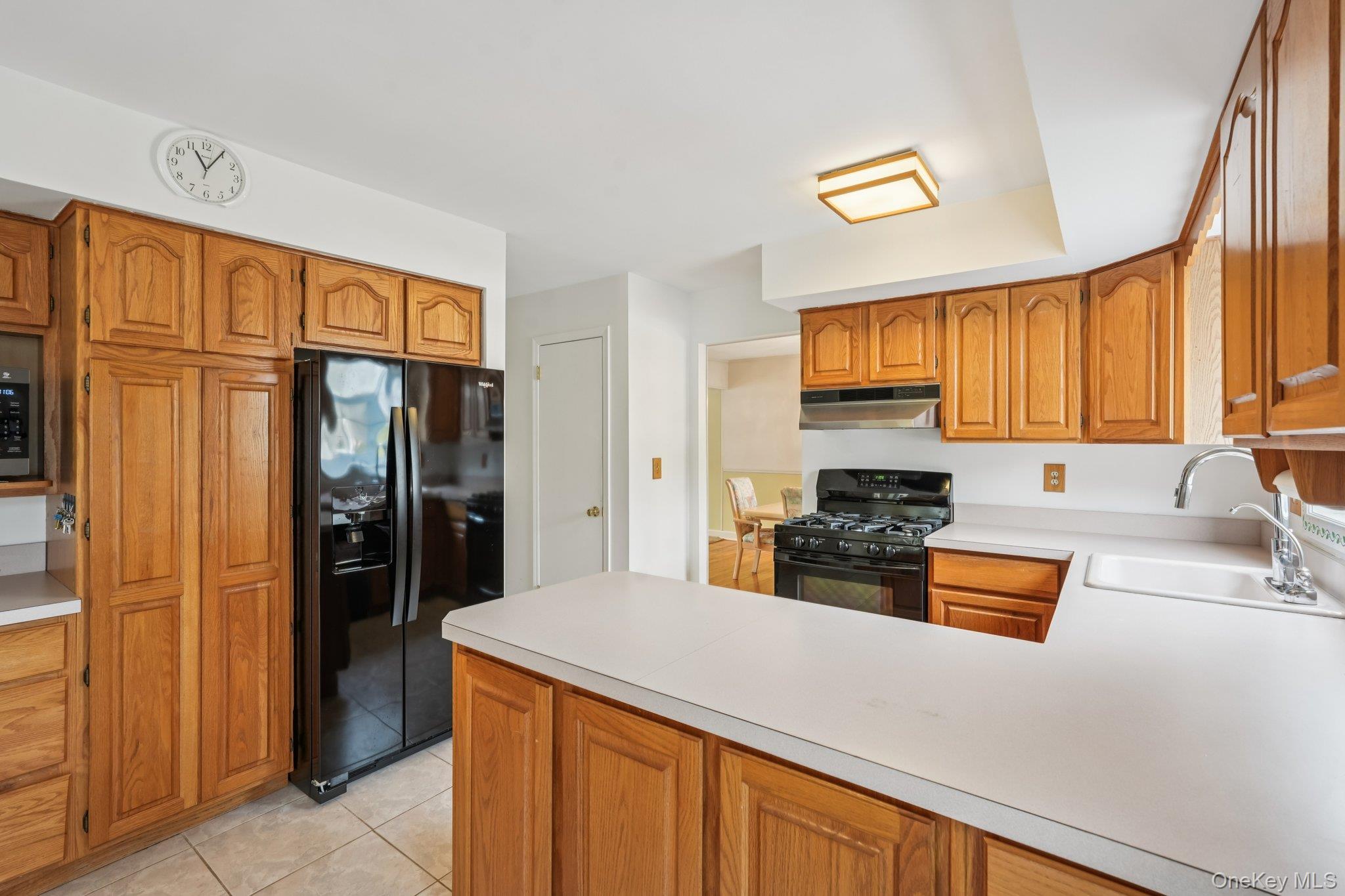 23 Oriole Road New City, NY 10956 - Photo 13 of 43 a kitchen with stainless steel appliances granite countertop a refrigerator and a sink