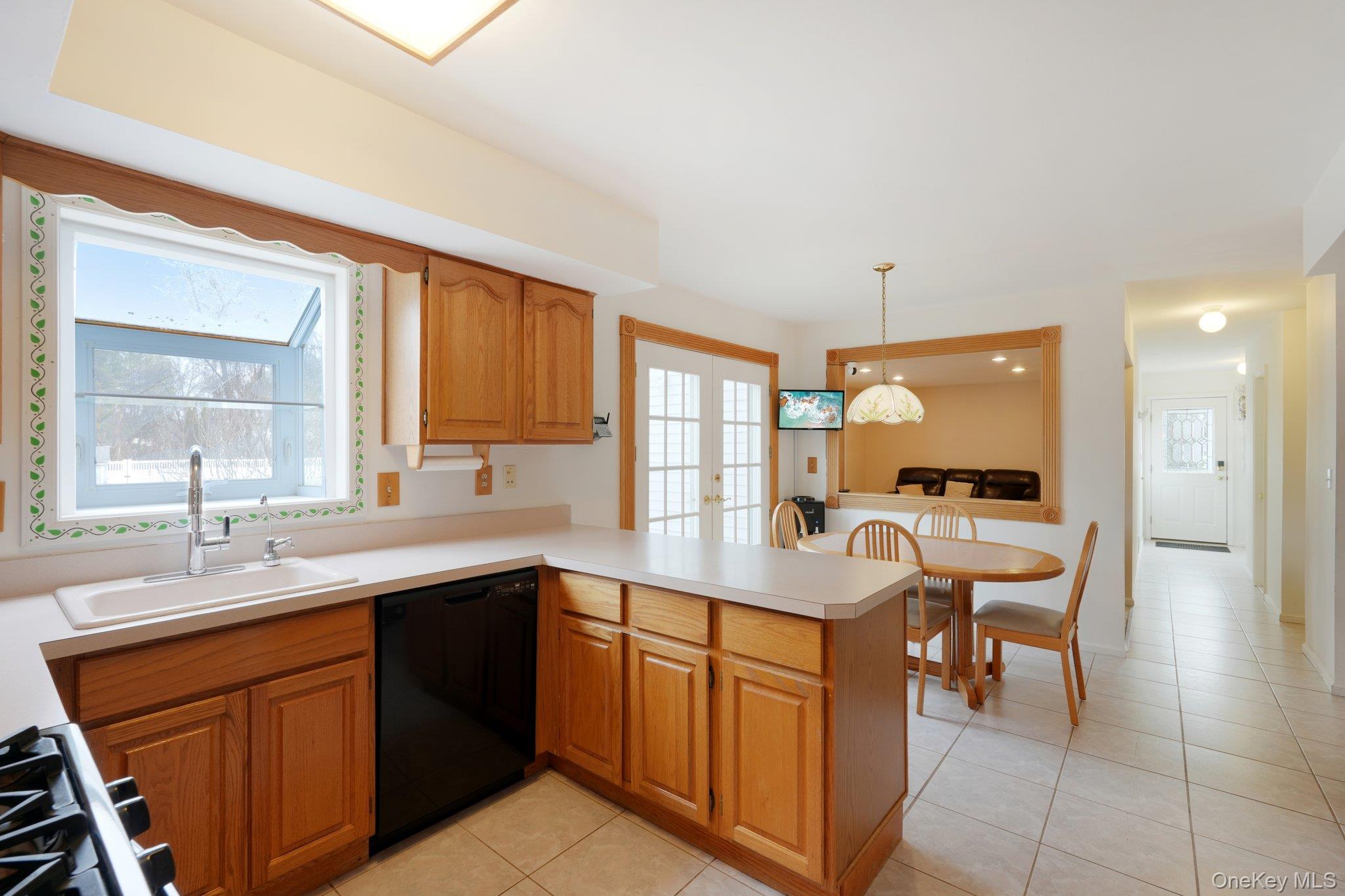 23 Oriole Road New City, NY 10956 - Photo 14 of 43 a large kitchen with a sink and cabinets