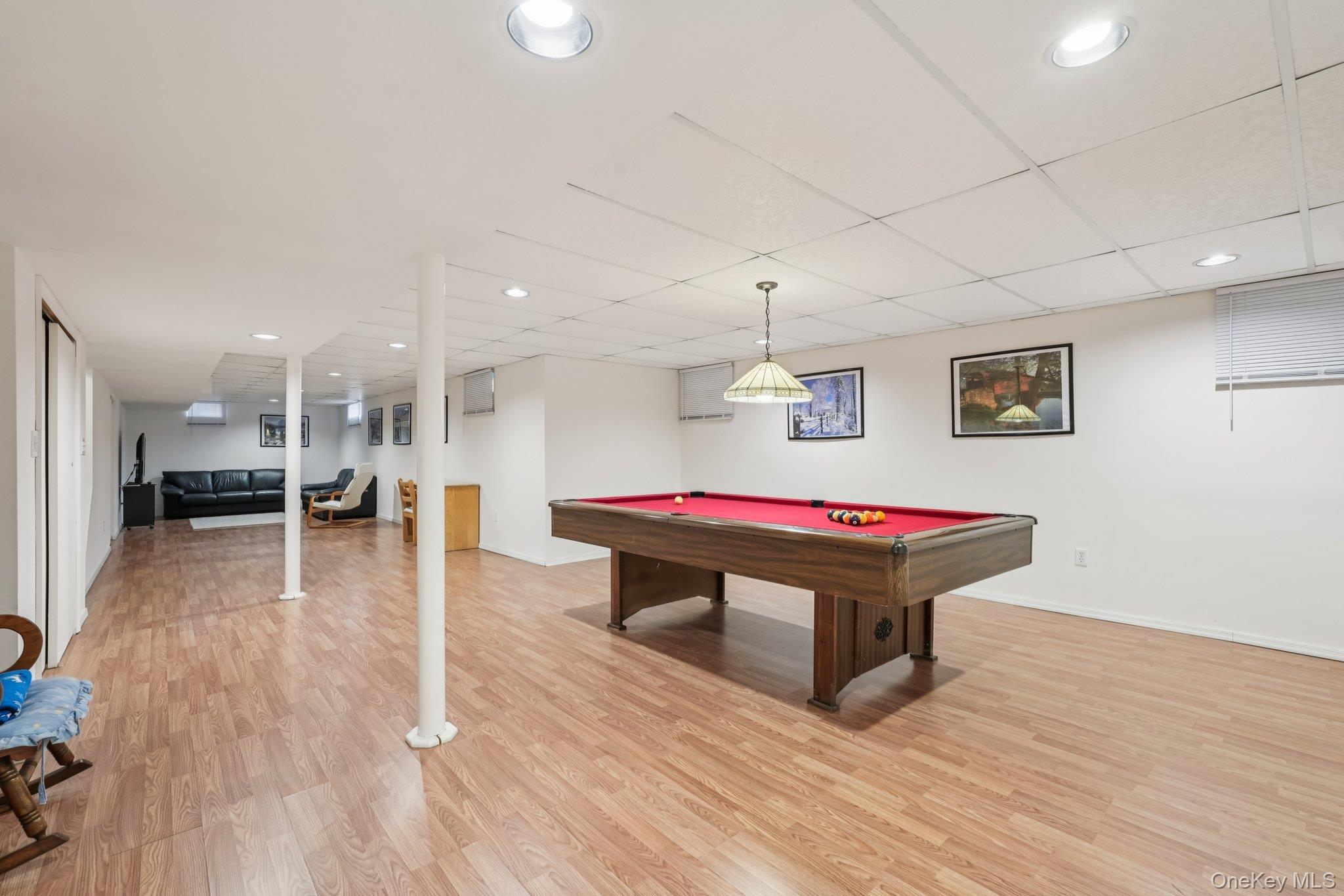 23 Oriole Road New City, NY 10956 - Photo 30 of 43 a room with wooden floor and pool table