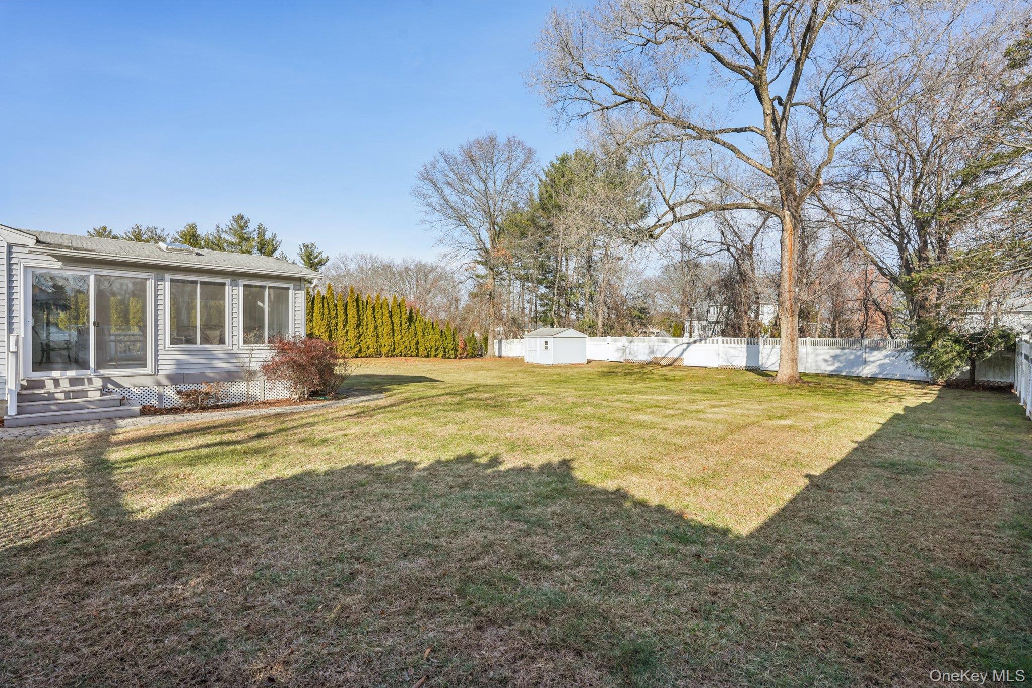 23 Oriole Road New City, NY 10956 - Photo 32 of 43 a view of a house with swimming pool and a yard