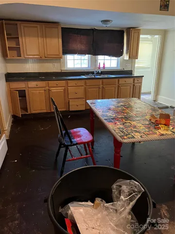 a kitchen with a stove and a sink