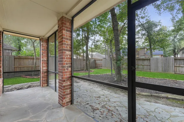 a backyard of a house with lots of green space
