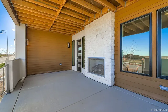 a view of a room that has a fireplace