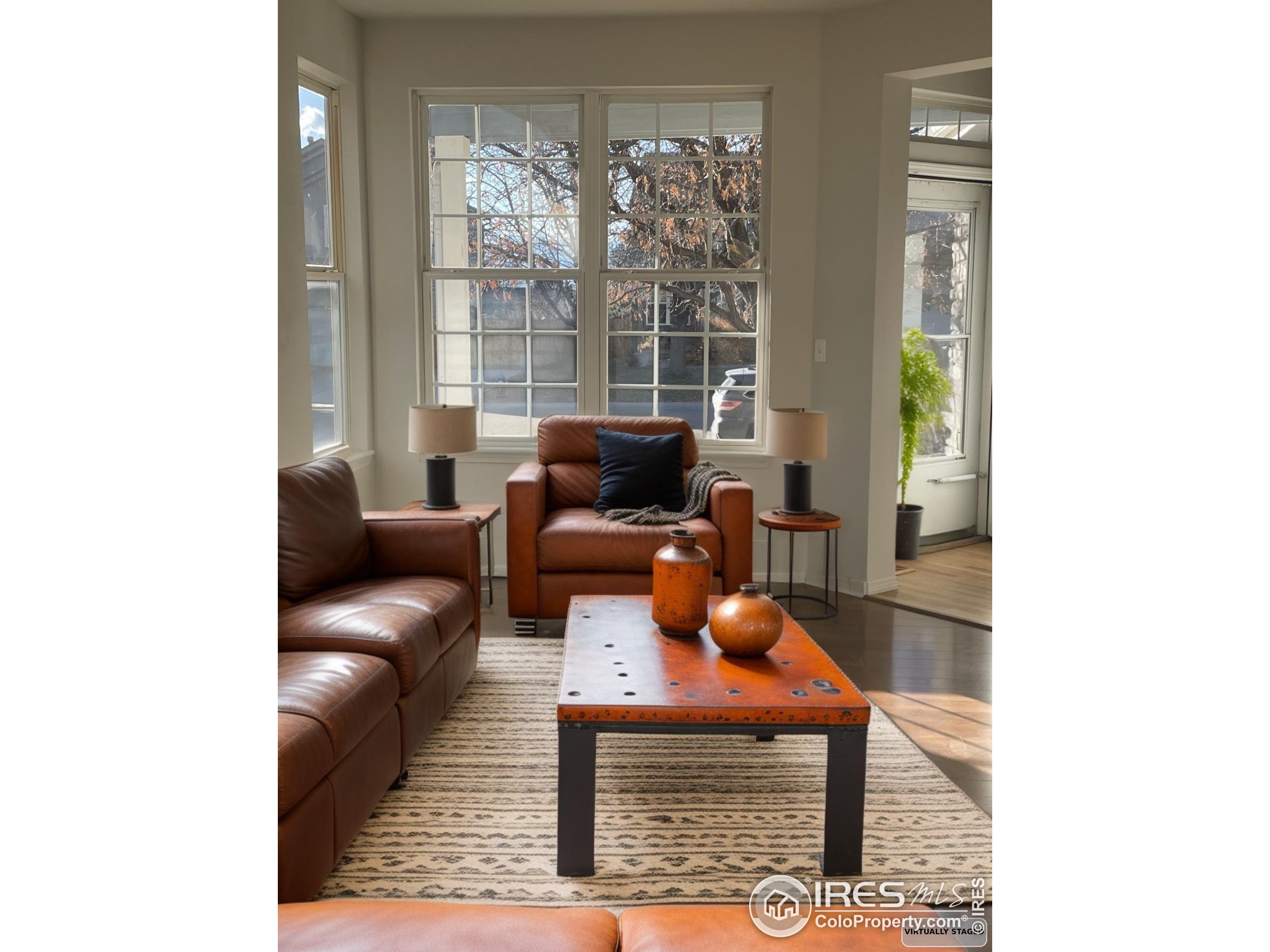 613 Rider Ridge Drive Longmont, CO 80504 - Photo 2 of 34 a living room with furniture and a window