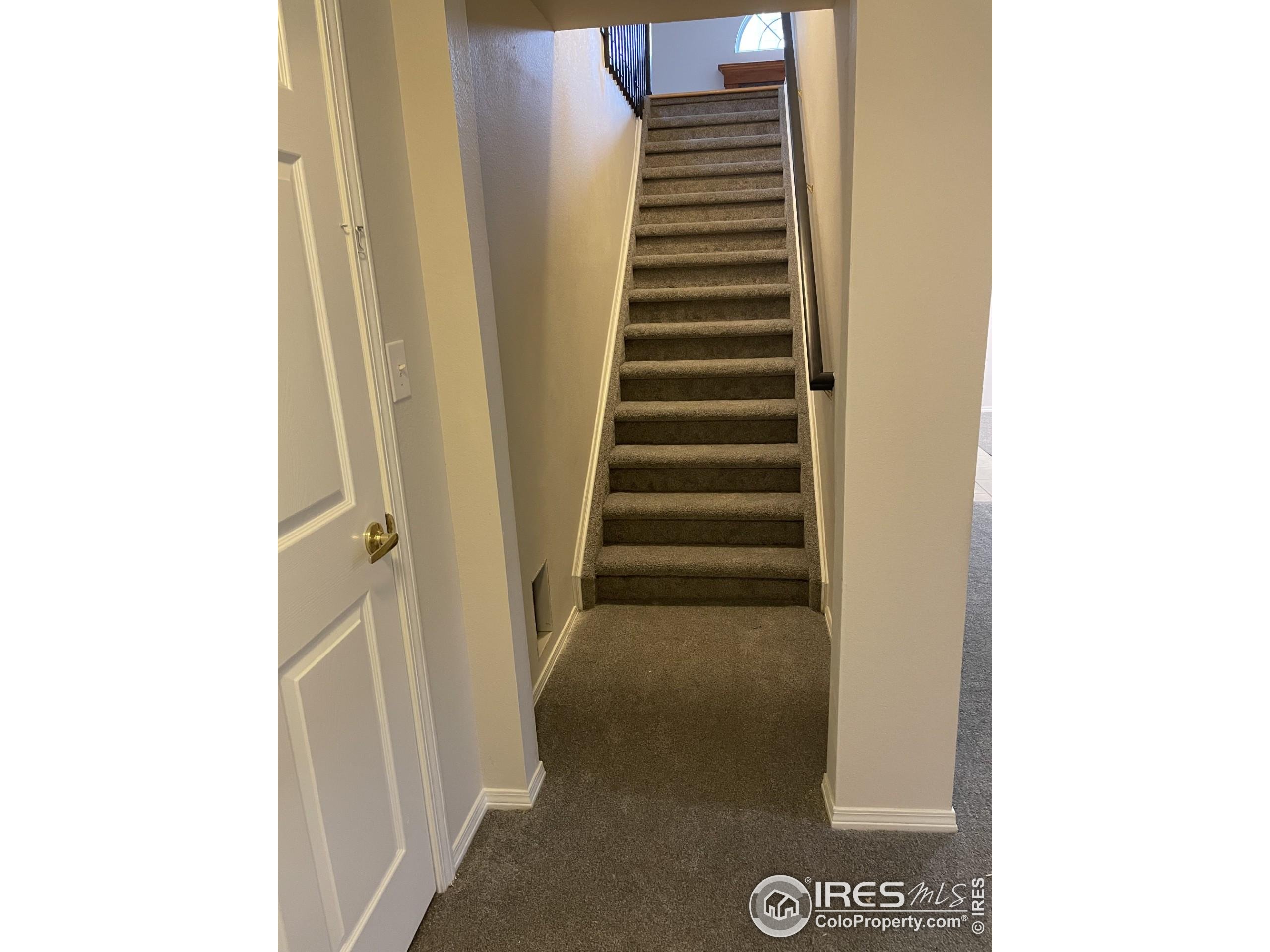 613 Rider Ridge Drive Longmont, CO 80504 - Photo 30 of 34 a view of an entryway with staircase