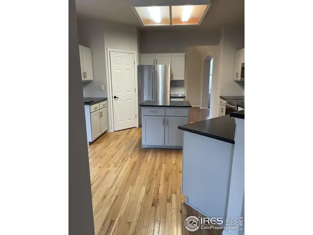 a kitchen with a sink and a stove