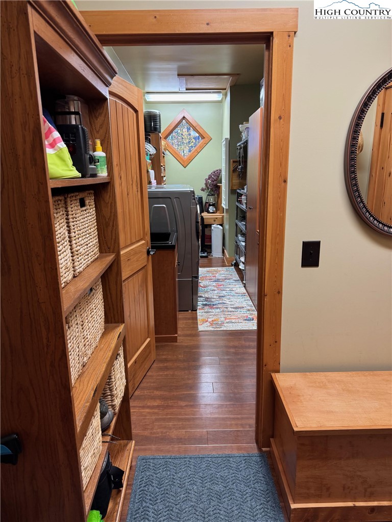 2650 Carson Woods Road Laurel Springs, NC 28644 - Photo 30 of 50 a hallway with furniture and wooden floor