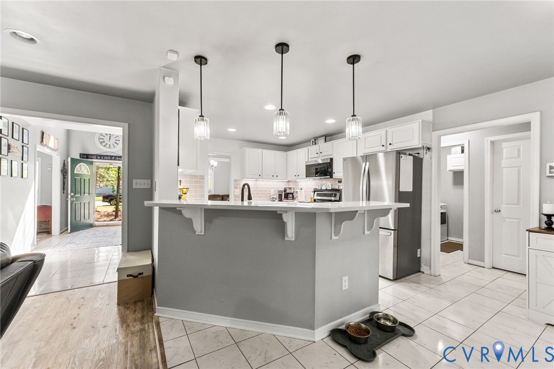 3120 Denise Road Petersburg, VA 23805 - Photo 35 of 51 Kitchen featuring a large island with counter seat