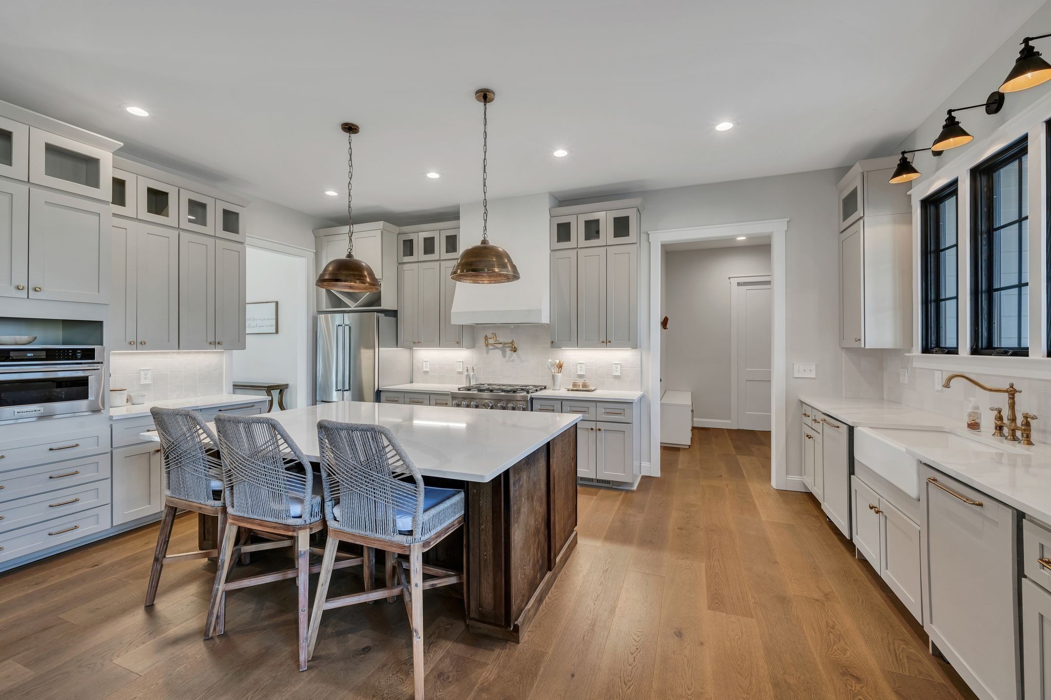 673 Billy Wynn Road Dickson, TN 37055 - Photo 15 of 56 a kitchen with kitchen island granite countertop lots of wooden cabinets a sink and appliances