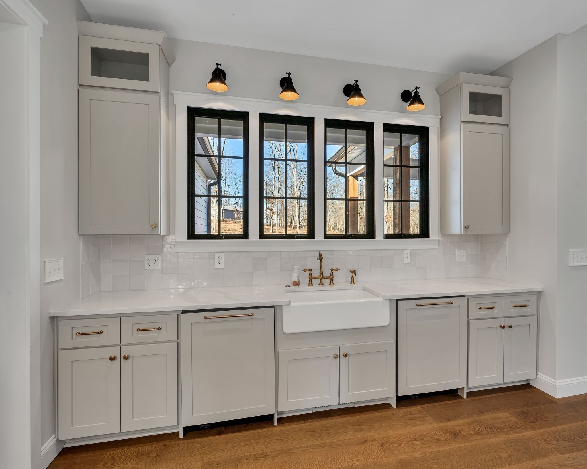 673 Billy Wynn Road Dickson, TN 37055 - Photo 17 of 56 a kitchen with white cabinets and sink