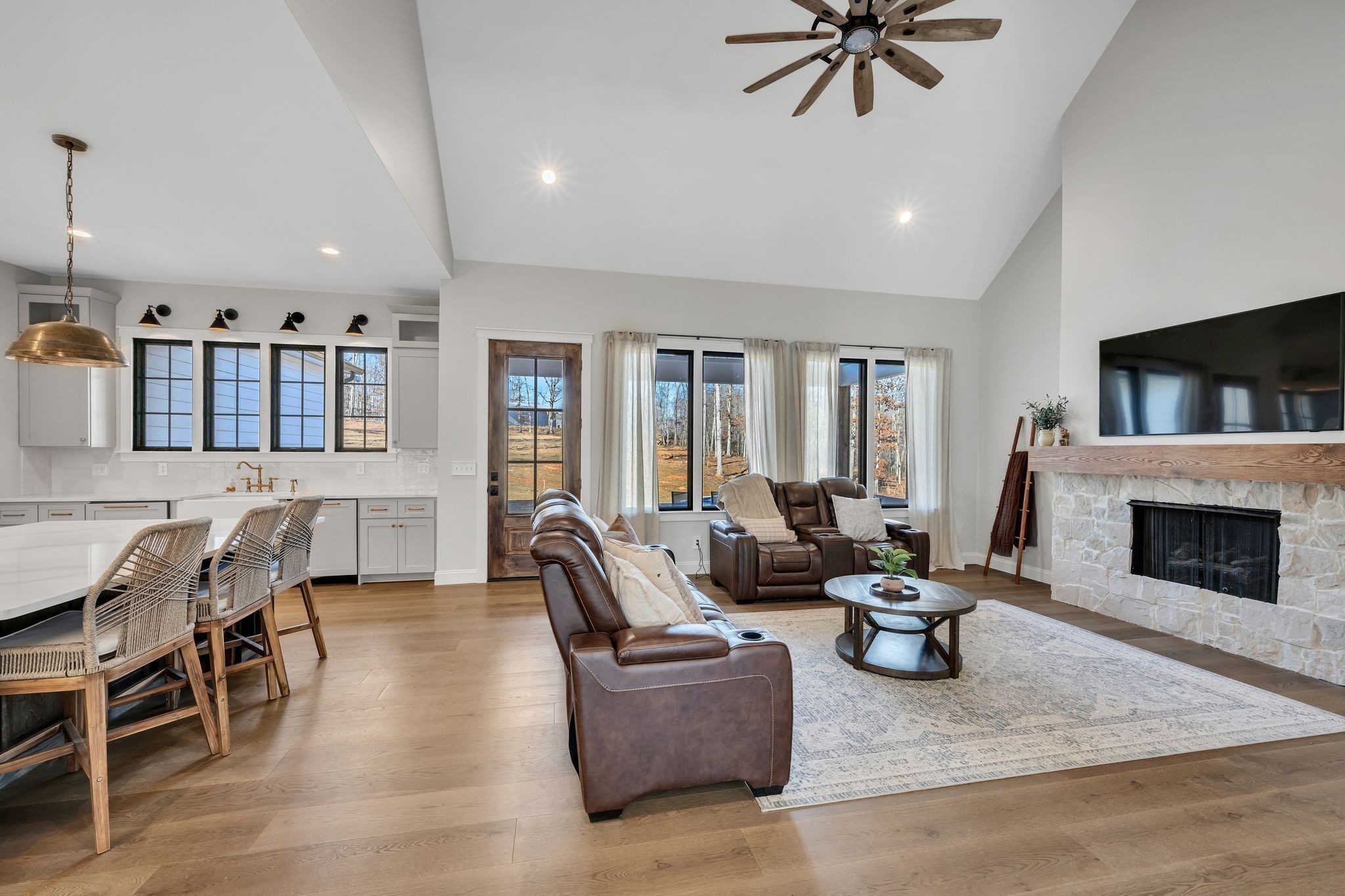 673 Billy Wynn Road Dickson, TN 37055 - Photo 20 of 56 a living room with furniture and a fireplace