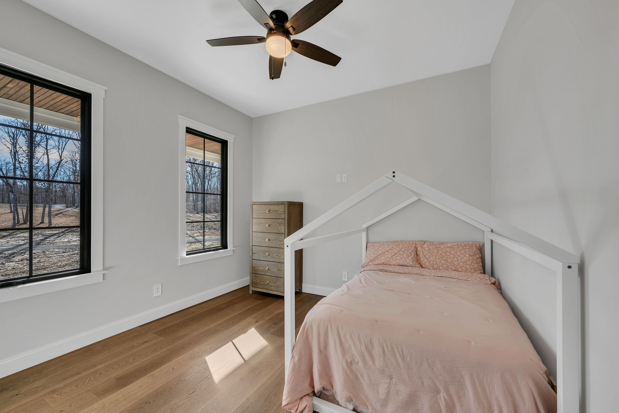 673 Billy Wynn Road Dickson, TN 37055 - Photo 34 of 56 a bedroom with a bed and a window