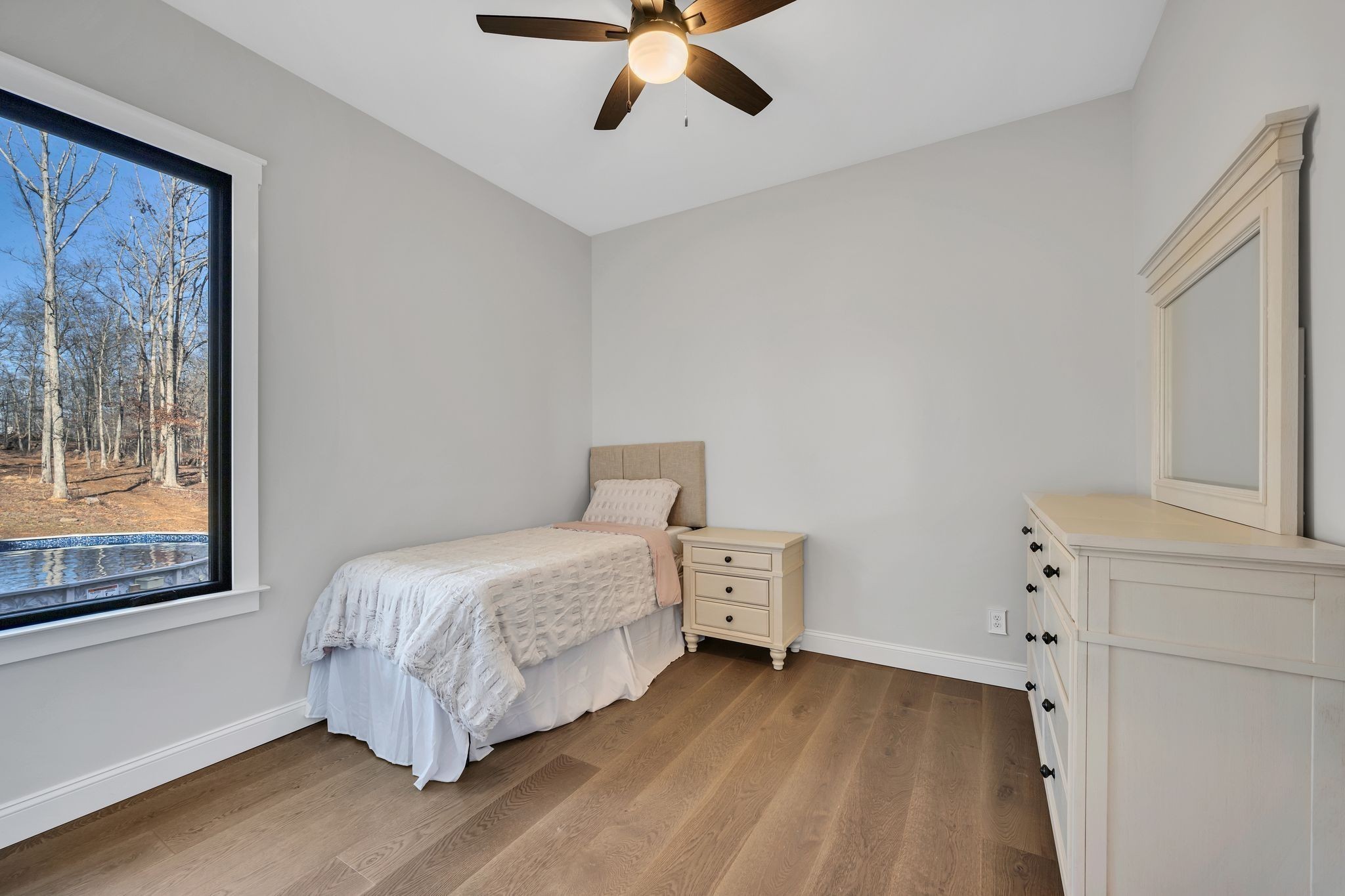 673 Billy Wynn Road Dickson, TN 37055 - Photo 36 of 56 a bedroom with a bed and a window