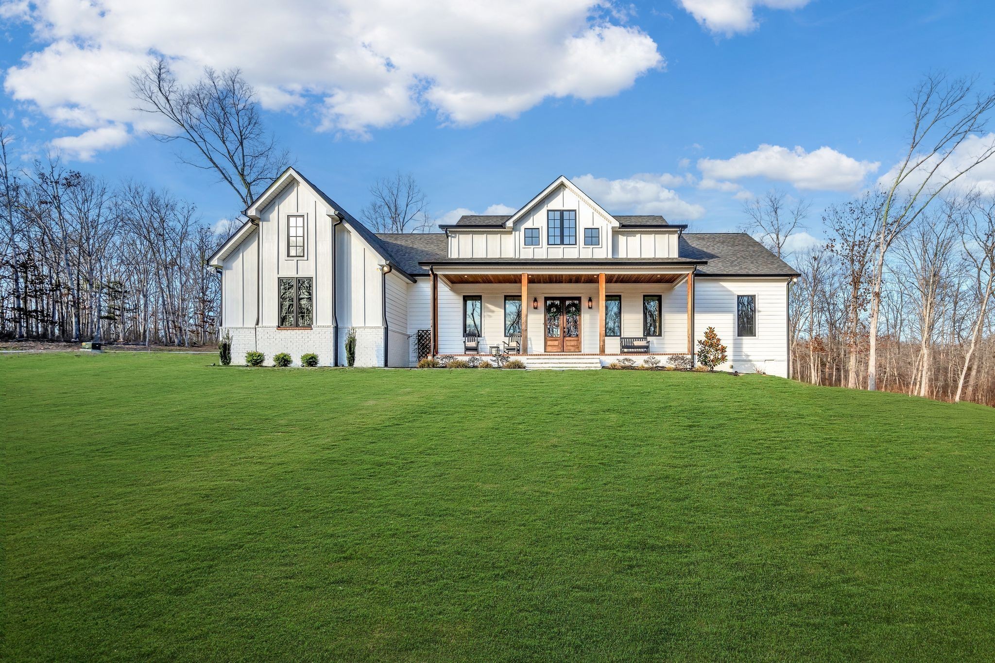 673 Billy Wynn Road Dickson, TN 37055 - Photo 4 of 56 a front view of a house with a garden
