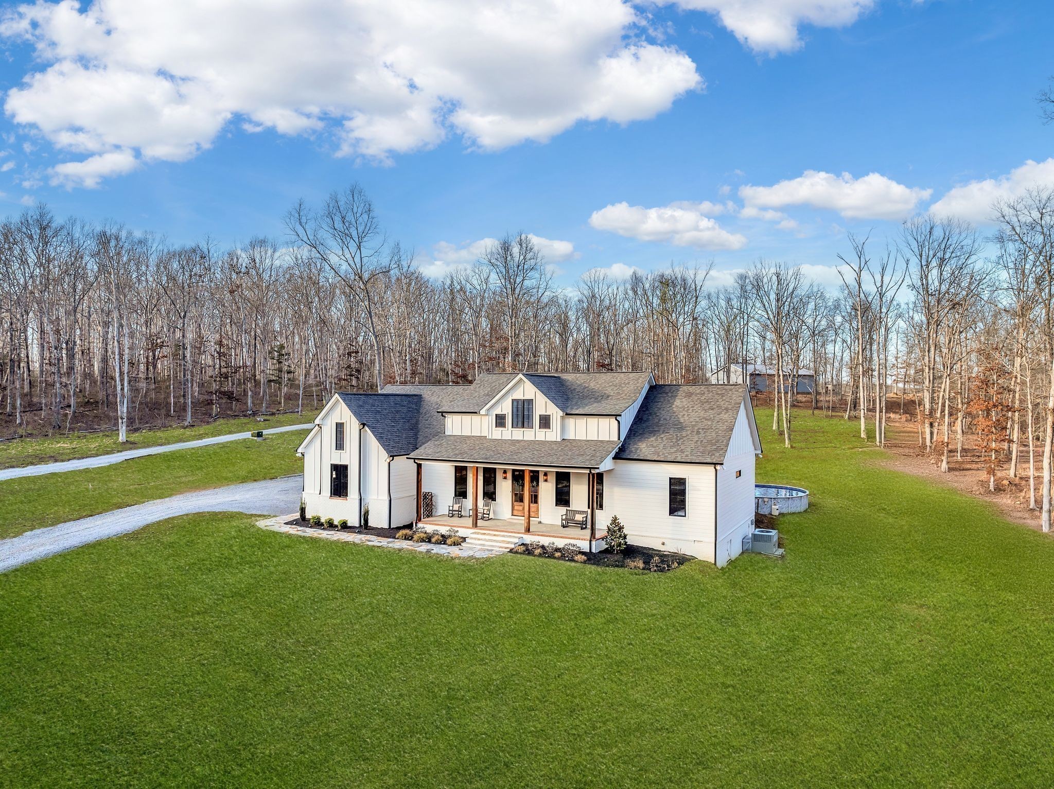 673 Billy Wynn Road Dickson, TN 37055 - Photo 49 of 56 a front view of a house with garden and trees