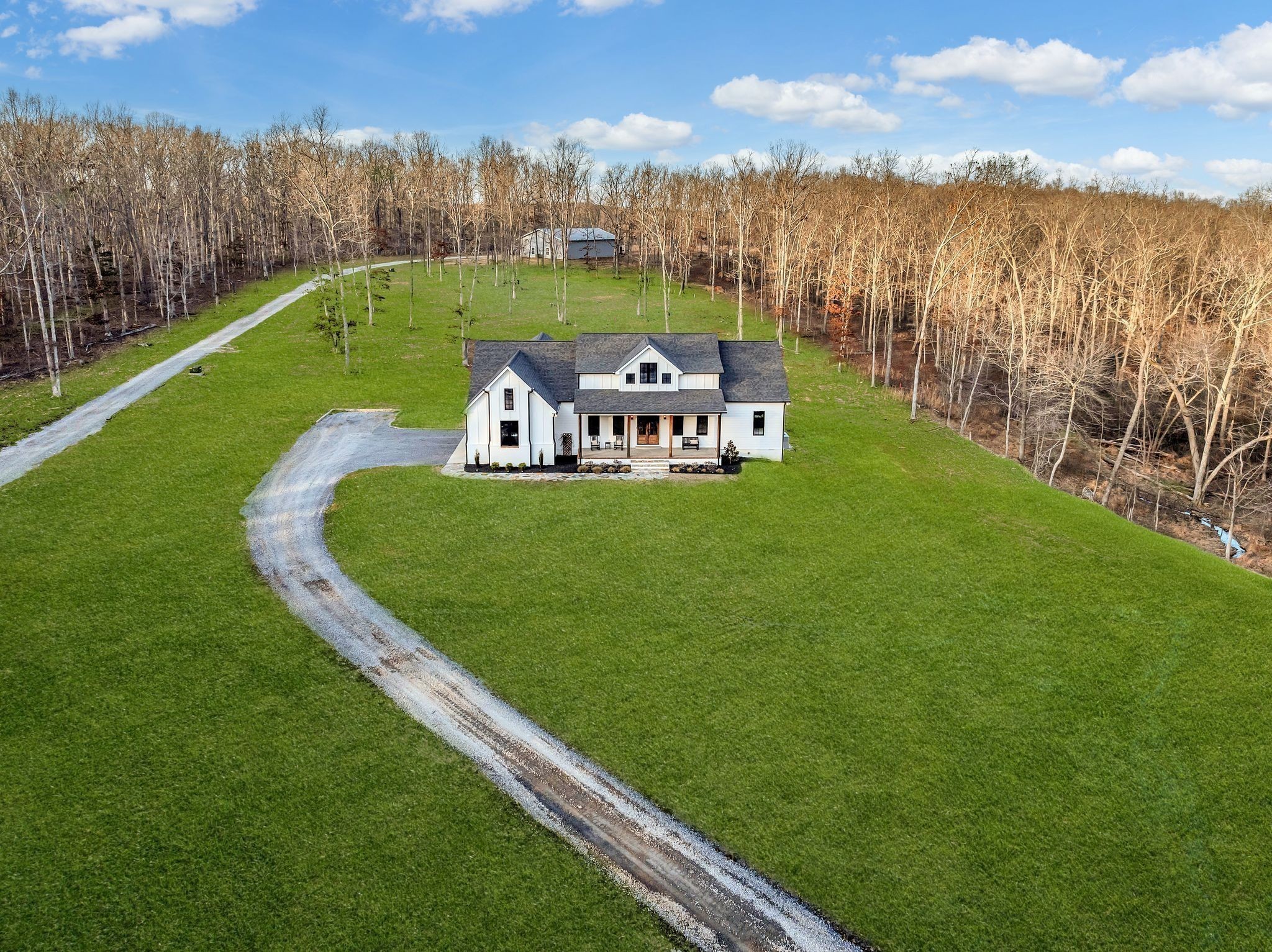 673 Billy Wynn Road Dickson, TN 37055 - Photo 9 of 56 a view of a big yard with large trees