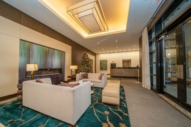 a living room with a couch and a table