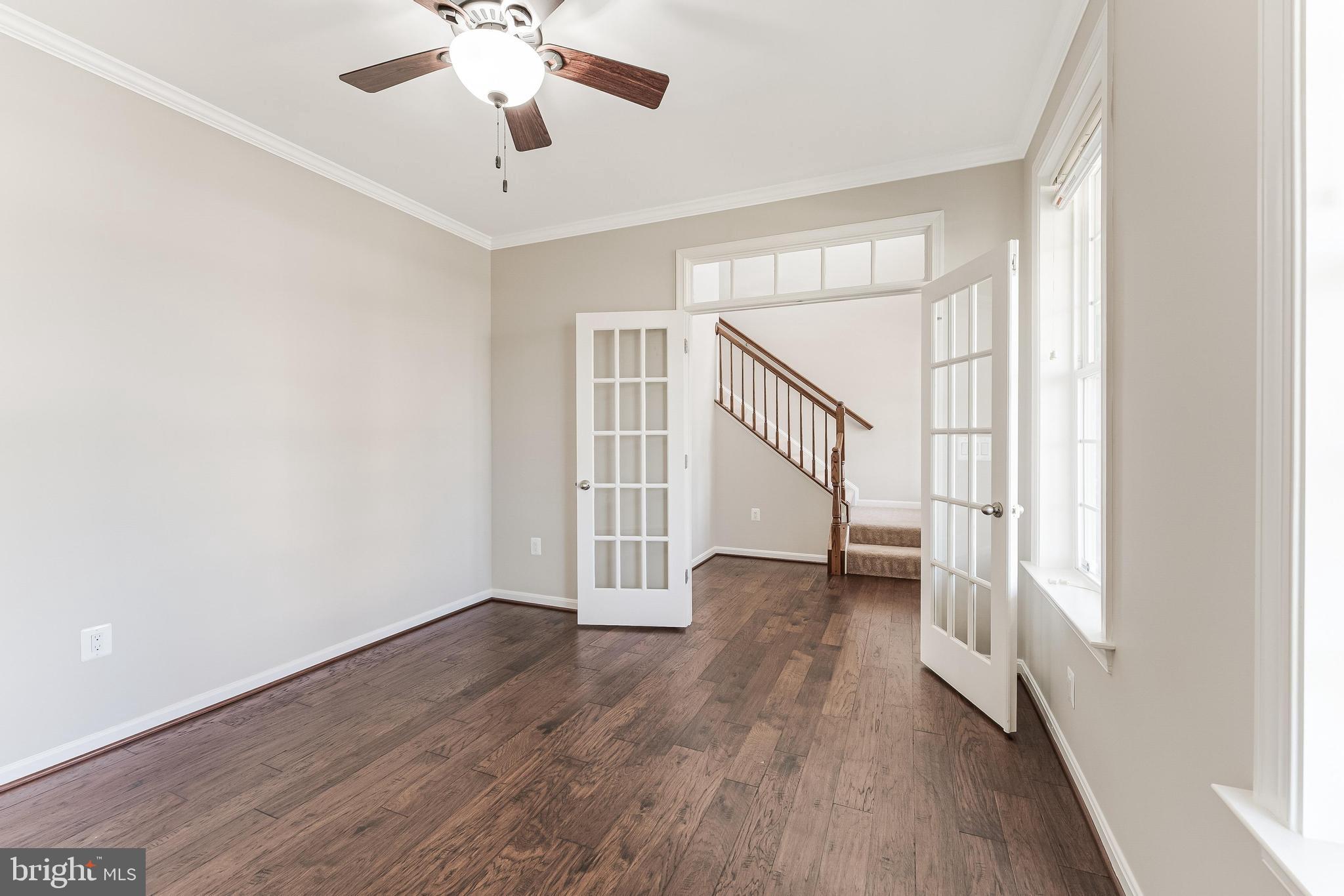 18747 Pier Trail Drive Triangle, VA 22172 - Photo 23 of 84 wooden floor in an empty room with a window