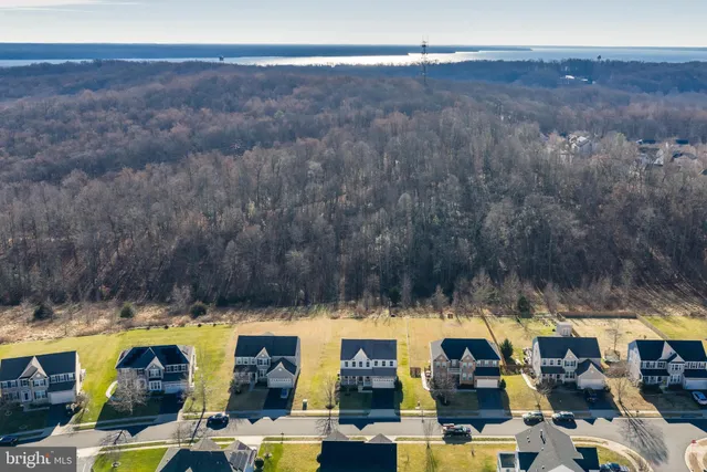 a view of swimming pool with outdoor seating and yard