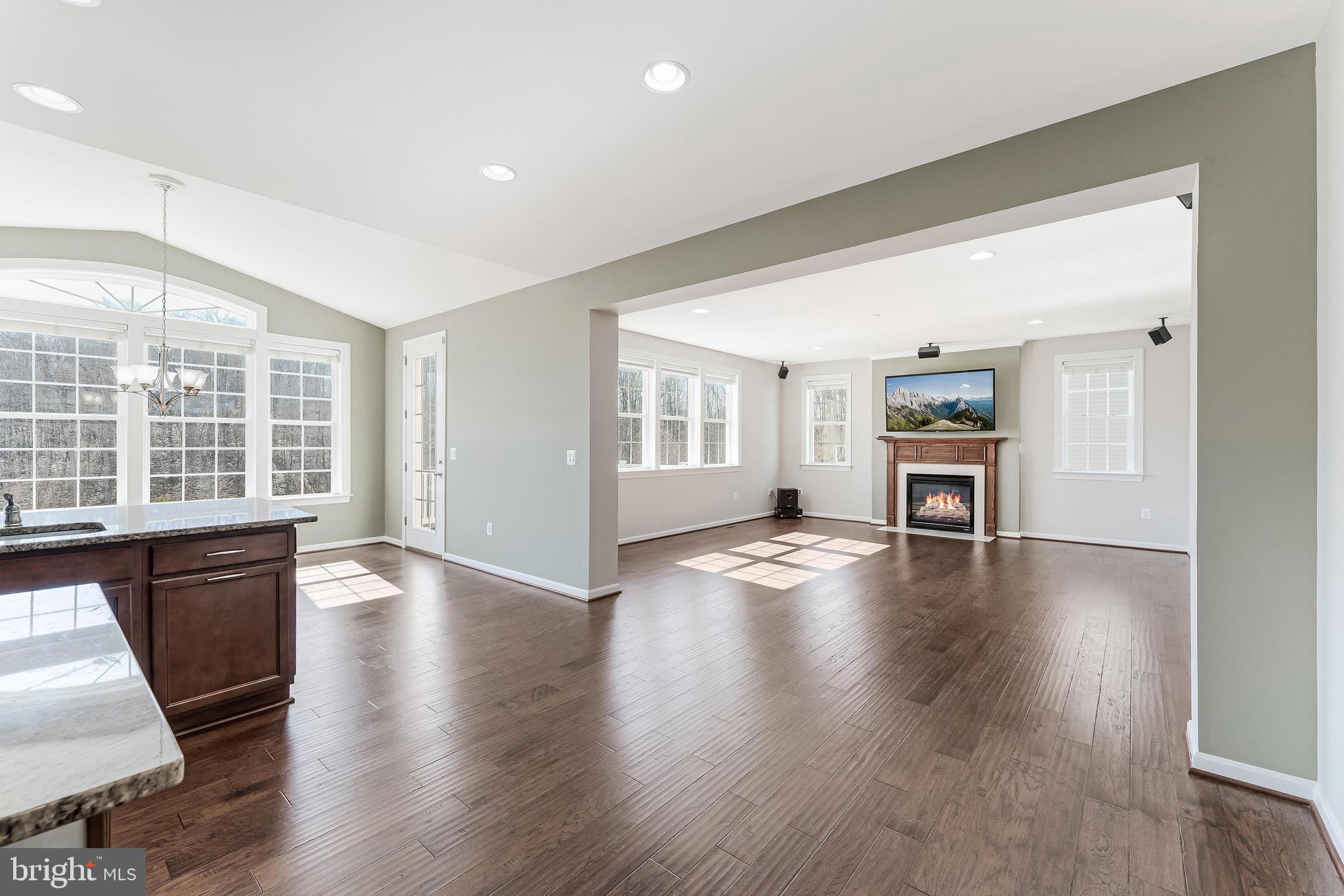 18747 Pier Trail Drive Triangle, VA 22172 - Photo 34 of 84 a view of a livingroom with furniture wooden floor and windows