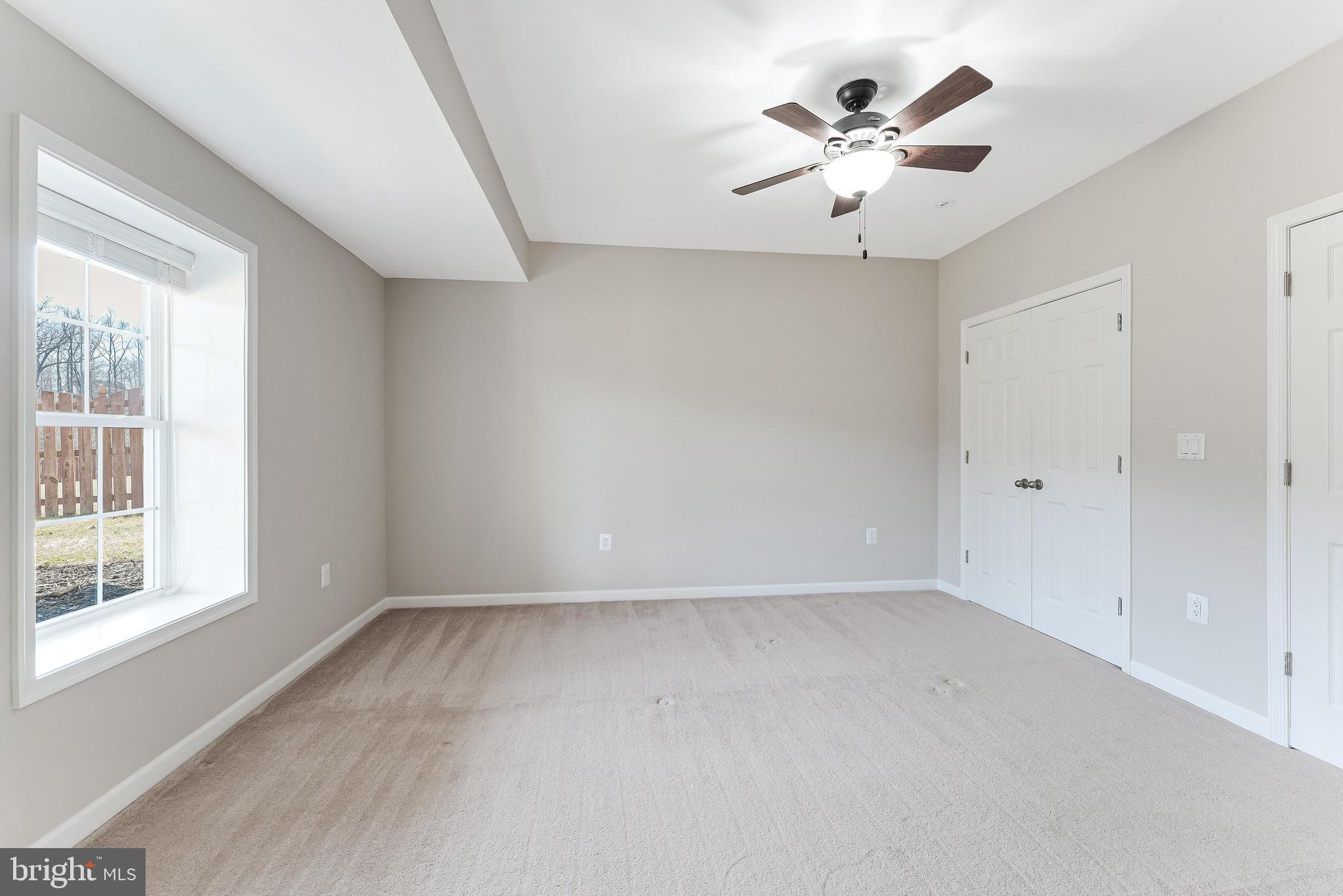 18747 Pier Trail Drive Triangle, VA 22172 - Photo 79 of 84 wooden floor in an empty room with a window
