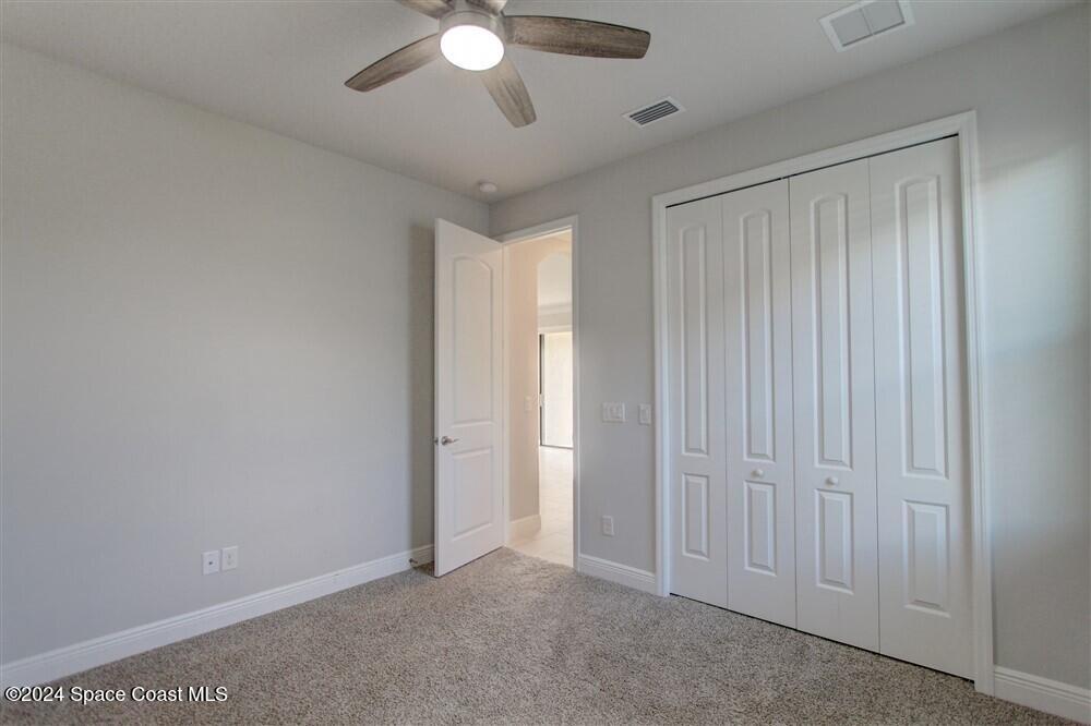 3267 Addison Drive Melbourne, FL 32940 - Photo 15 of 37 wooden floor in an empty room