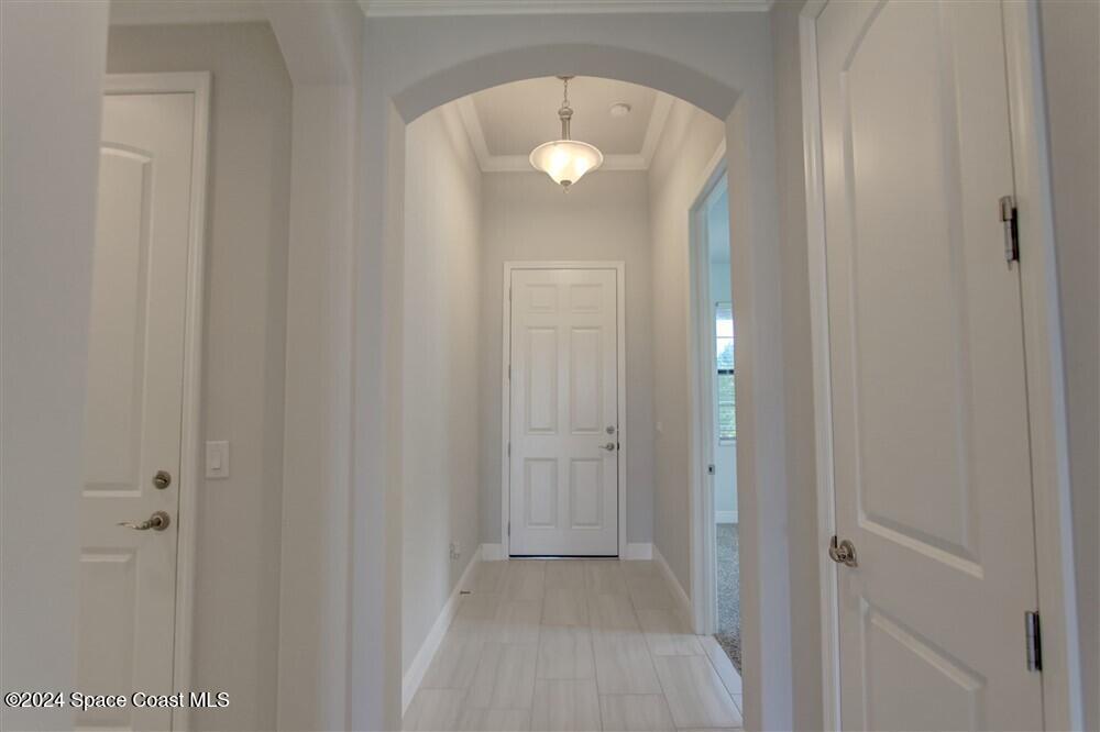 3267 Addison Drive Melbourne, FL 32940 - Photo 3 of 37 a view of a hallway with front door