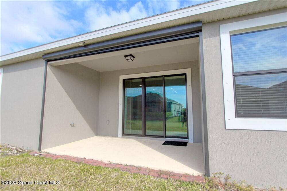 3267 Addison Drive Melbourne, FL 32940 - Photo 32 of 37 a view of a backyard of a house