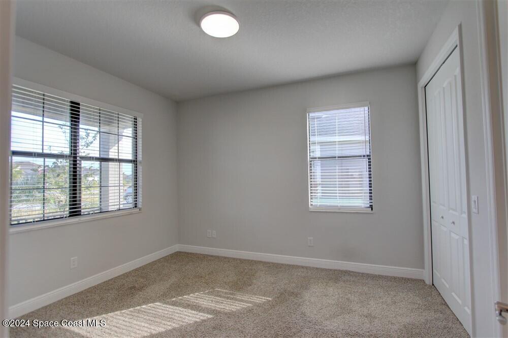 3267 Addison Drive Melbourne, FL 32940 - Photo 4 of 37 an empty room with a window