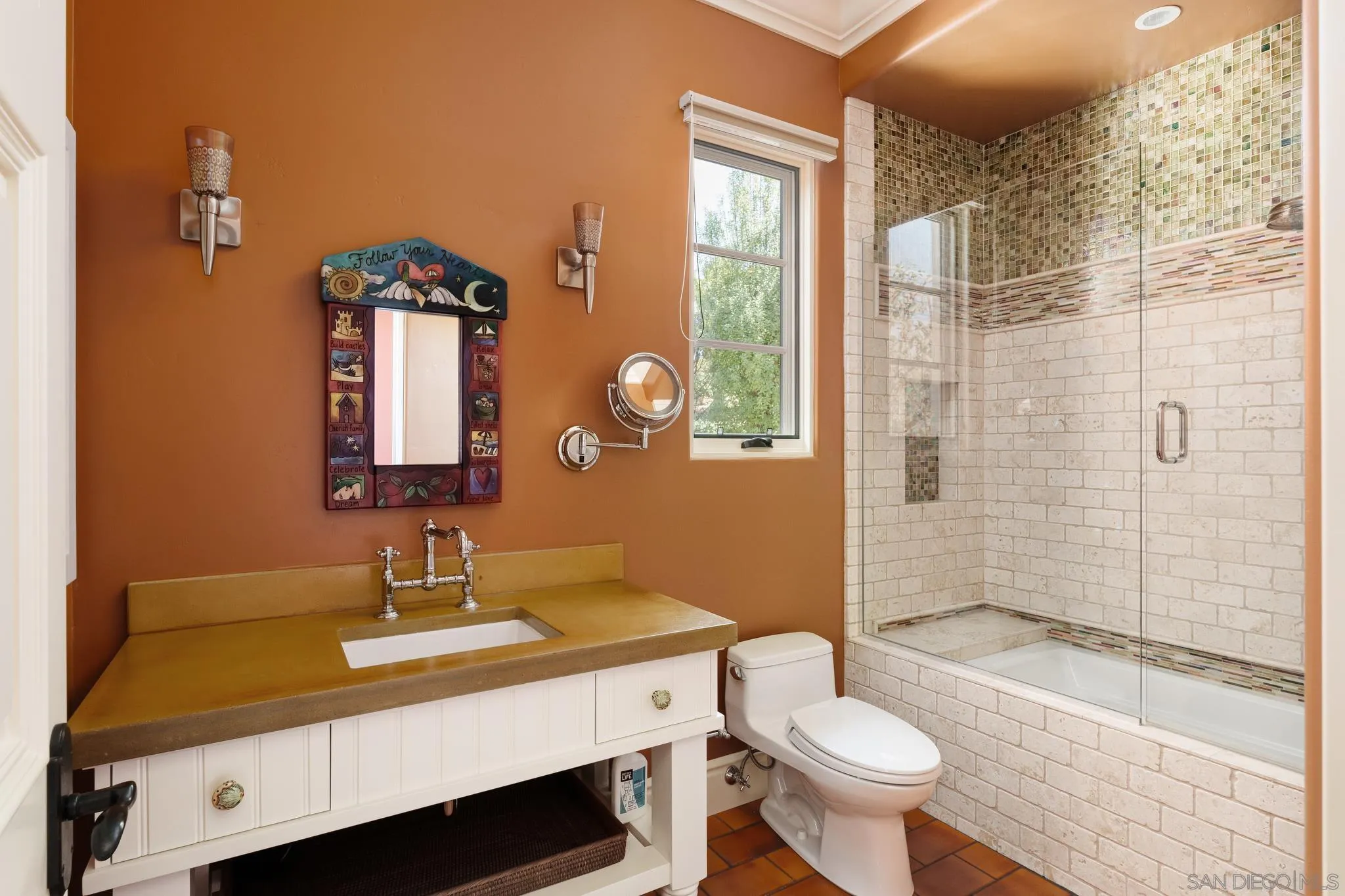6248 Strada Fragante Rancho Santa Fe, CA 92091 - Photo 15 of 38 a bathroom with a sink and a mirror