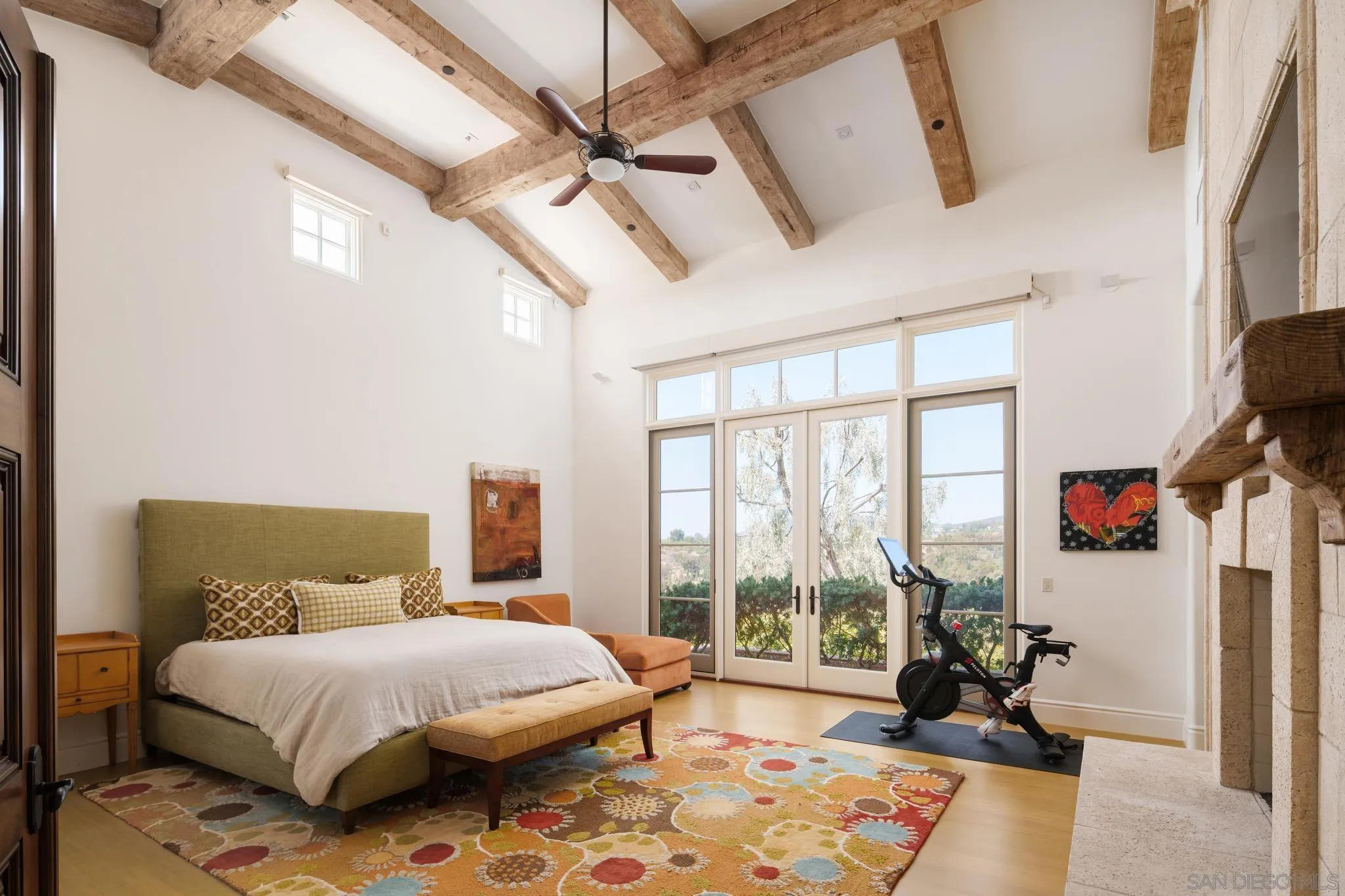6248 Strada Fragante Rancho Santa Fe, CA 92091 - Photo 19 of 38 a bedroom with a bed and a chandelier